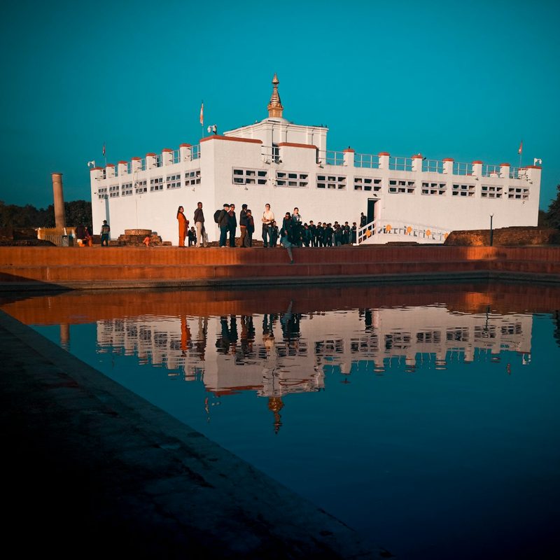 Maya Devi Temple reflected in the pond at Lumbini